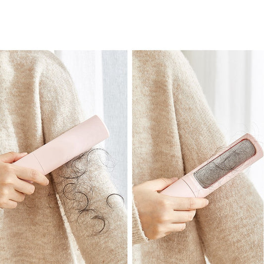 Rolling pet hair off fabric couch with reusable lint roller
