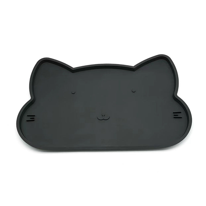 Silicone mat placed under pet food bowl for spill control